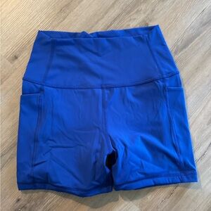 Royal blue exercise shorts with pockets